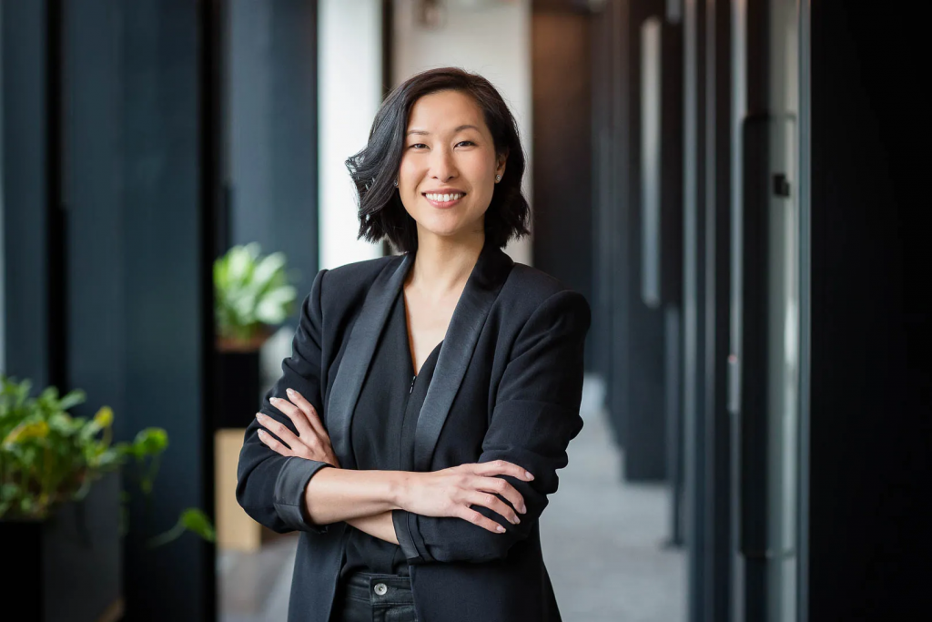 an asian woman professional headshot