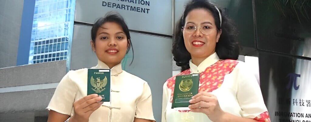 indonesia woman holding passports