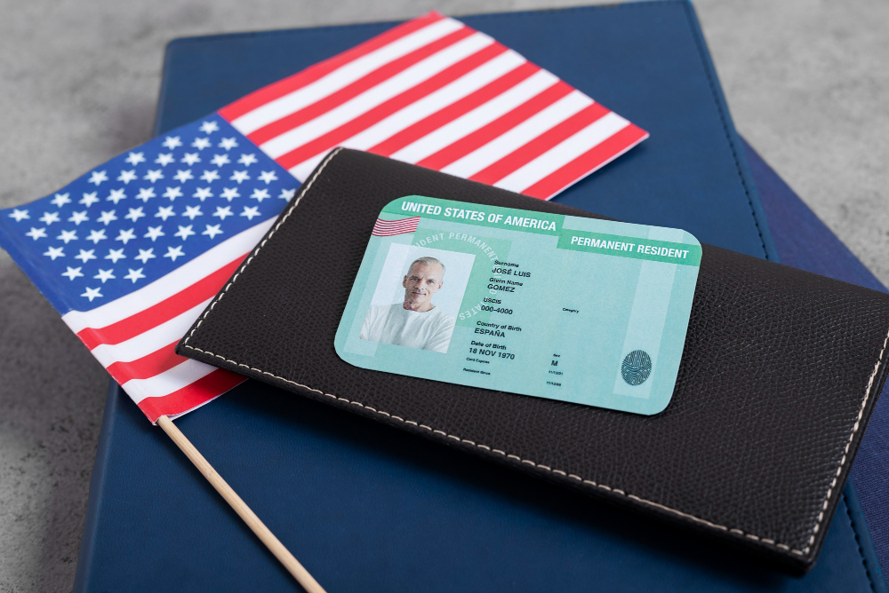 top view over green card application of a man