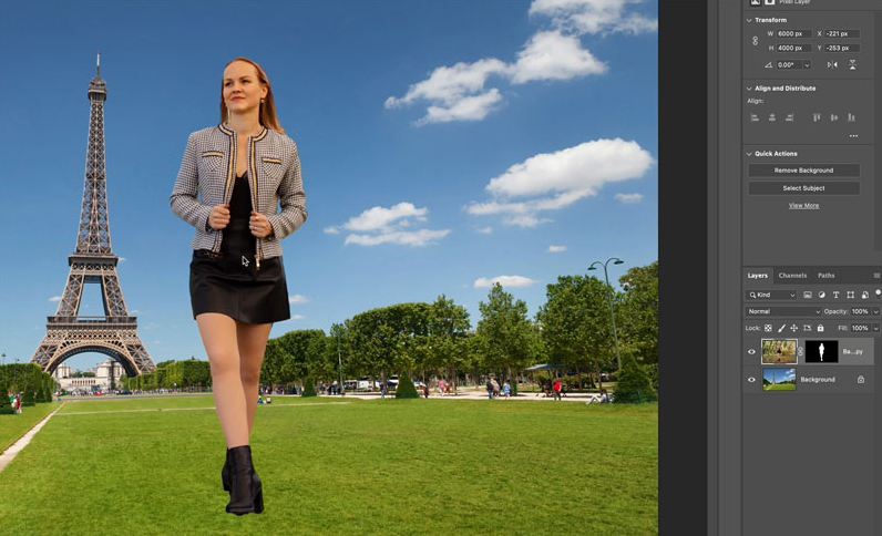 A person walking on a grass field