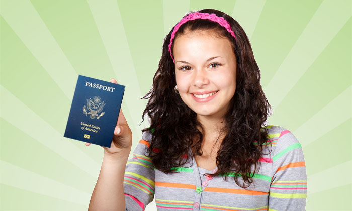 a girl holding a passport