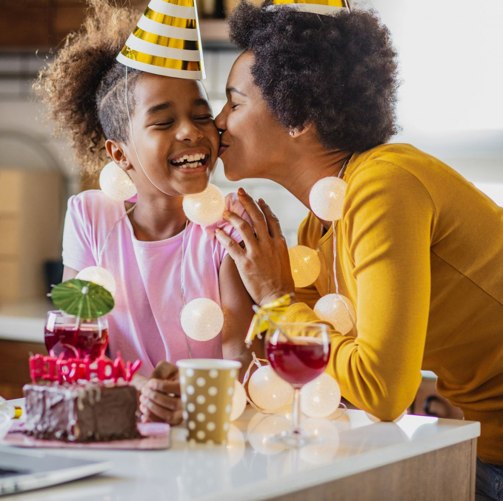 a woman and her daughter celebrating birthday