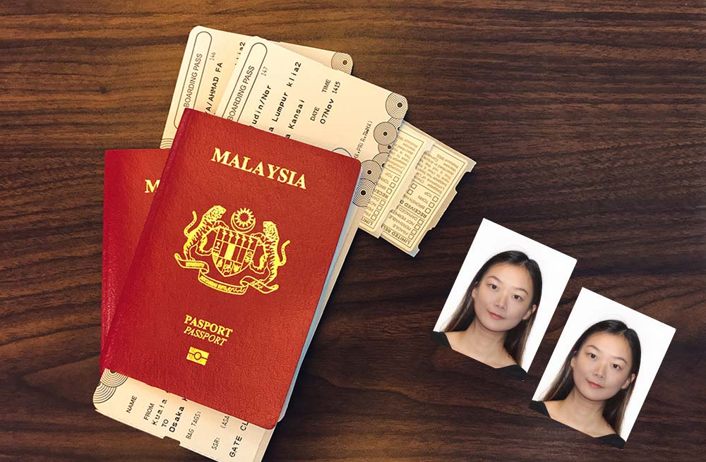 a malaysia passport with two passport photos