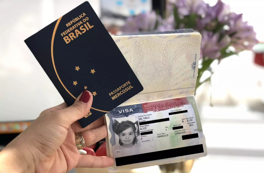 A brazil passport and a USA visa