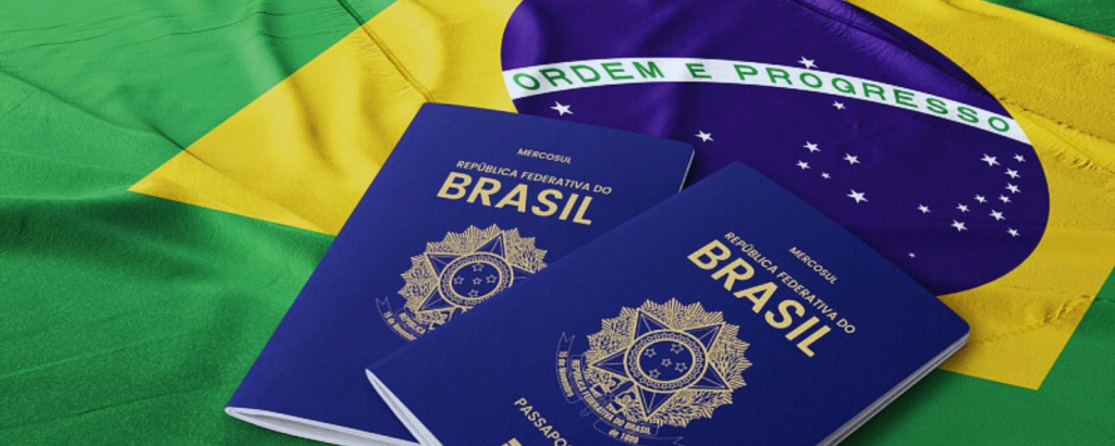 two Brazil passports on the Brazil national flag